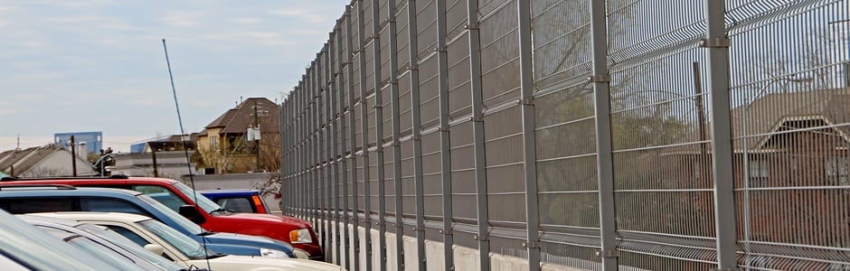 A designmaste Forte fencing system applied to a city parking deck deters and prevents accidents.