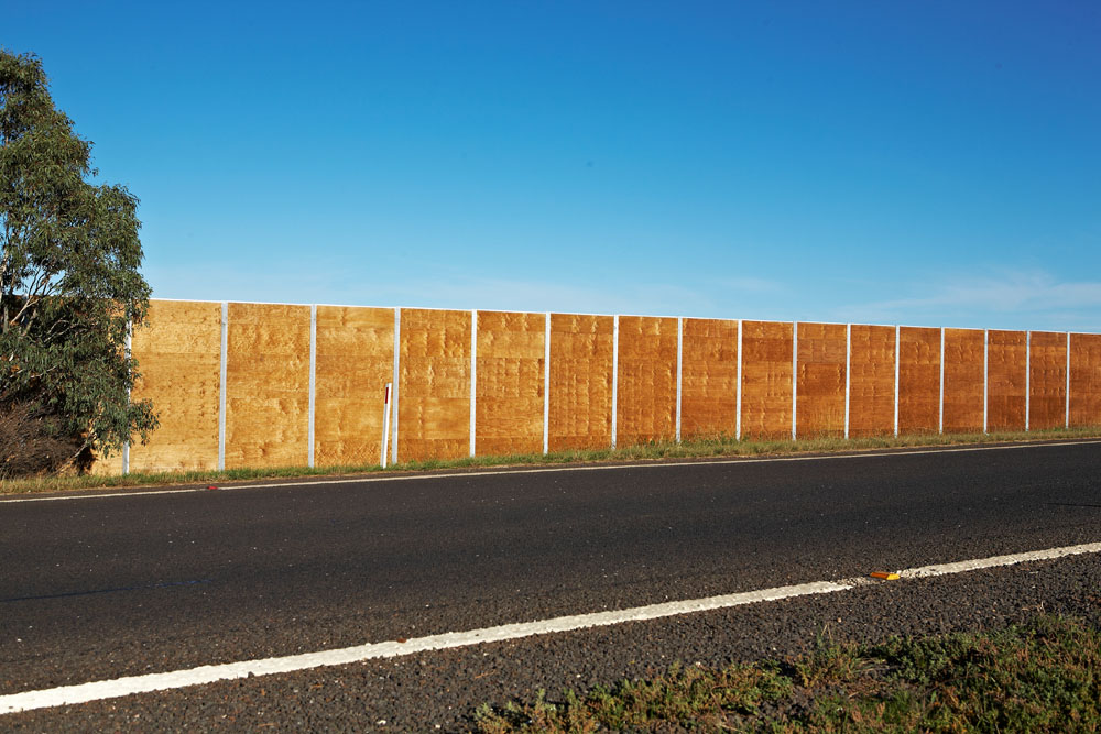 Wood panneling is an alternative to chainlink temporary fencing and makes it impossible to see construction on the other side.