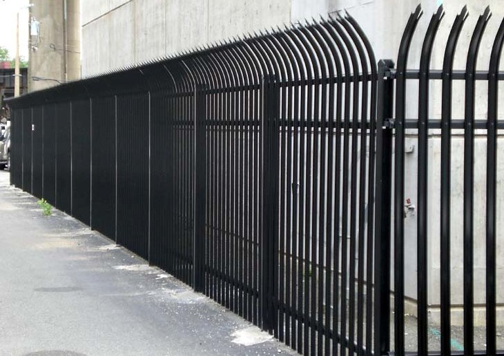 The James River Water Treatment pump in Shockoe Bottom Richmond is enclosed by 12 ft. curved spiked picket black steel 